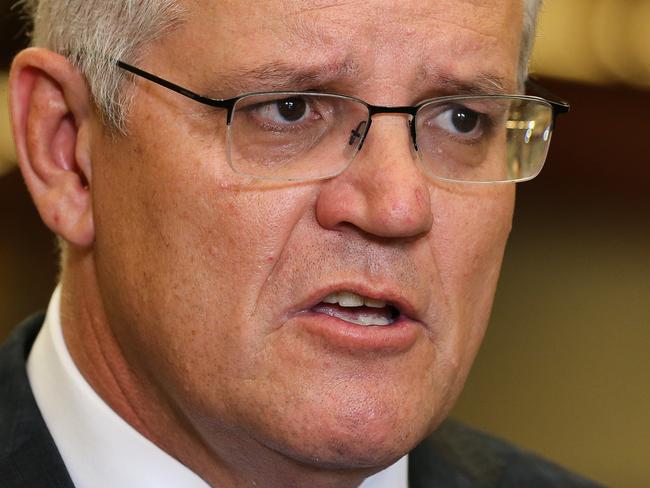 SYDNEY, AUSTRALIA - NewsWire Photos, DECEMBER 17 2021: Prime Minister Scott Morrison visits Opie Manufacturing and addresses the media during a press conference in Sydney. Picture: NCA Newswire / Gaye Gerard