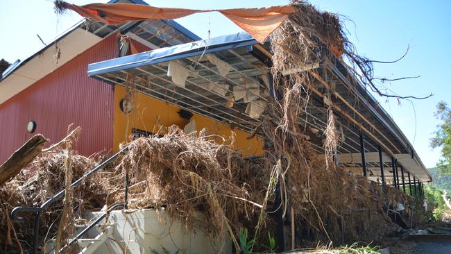 The remains of the Bana Yirriji Art and Cultural Centre and cafe at Wujal Wujal after the flood that peaked on December 17. Picture: Bronwyn Farr