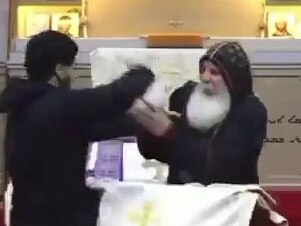 Assyrian Bishop Mar Mari Emmanuel being attacked while conducting mass at a church in western Sydney.