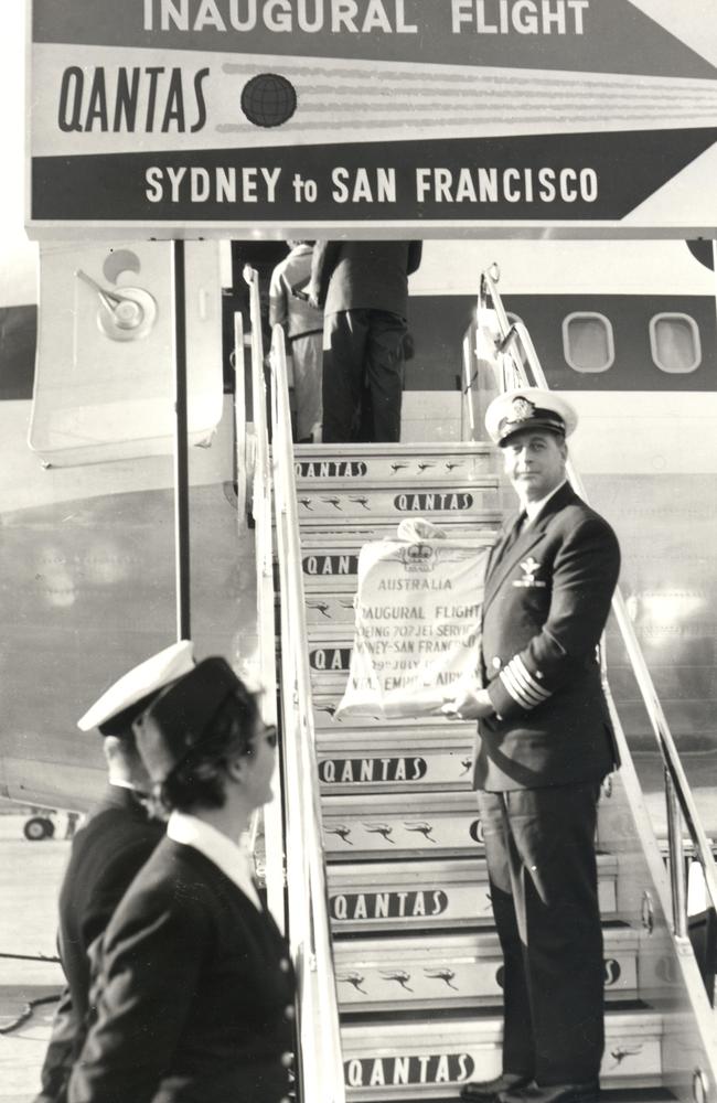 Captain Ian Ralfe with mail for the first Qantas jet service from Sydney to San Francisco on July 29, 1959. Picture: Qantas