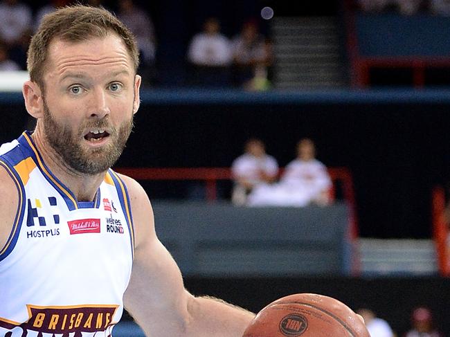 BRISBANE, AUSTRALIA - OCTOBER 06: Anthony Petrie of the Bullets takes on the defence during the round one NBL match between the Brisbane Bullets and the Perth Wildcats at the Brisbane Entertainment Centre on October 6, 2016 in Brisbane, Australia. (Photo by Bradley Kanaris/Getty Images)