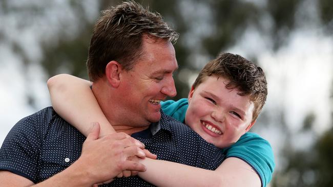 Layton Smith, 12, pictured with his father Troy at RAAF Memorial Park in Mt Druitt. For Public Defender.