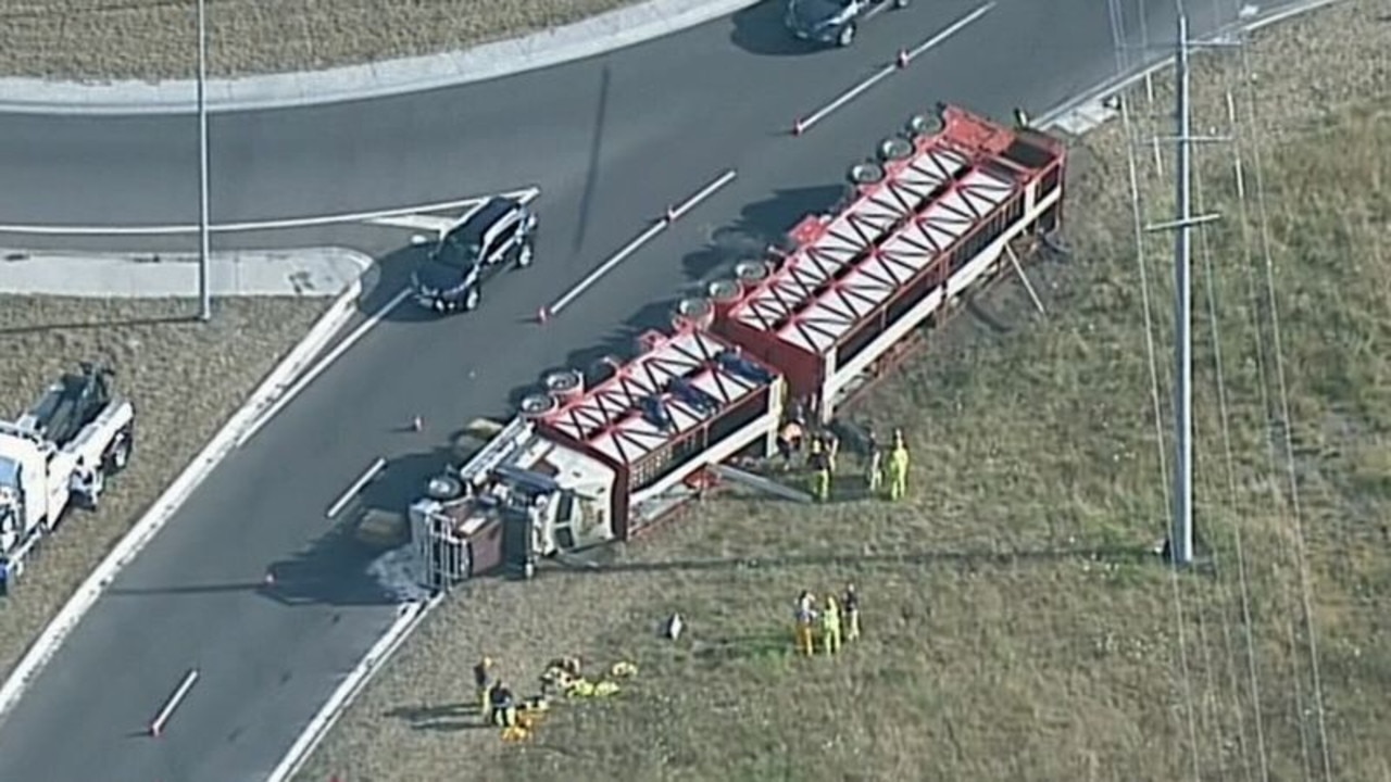 A B-double truck carrying cattle rolled in country Victoria.