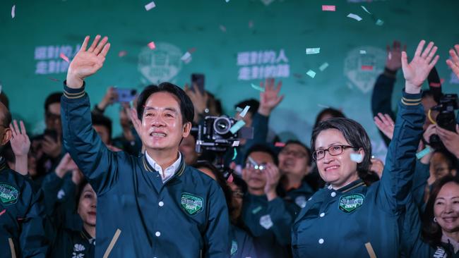 William Lai and running mate Hsiao Bi-khim savour victory at partys headquarters in Taipei on saturday. Picture: Getty Images