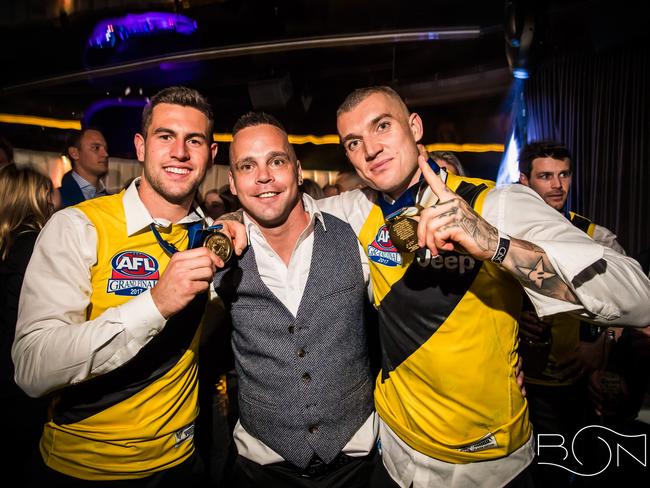 Dusty with teammate Jack Graham and former Tiger Jake King. Picture: Bond Bar