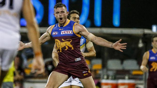 Pearce Hanley celebrates a goal against Gold Coast.