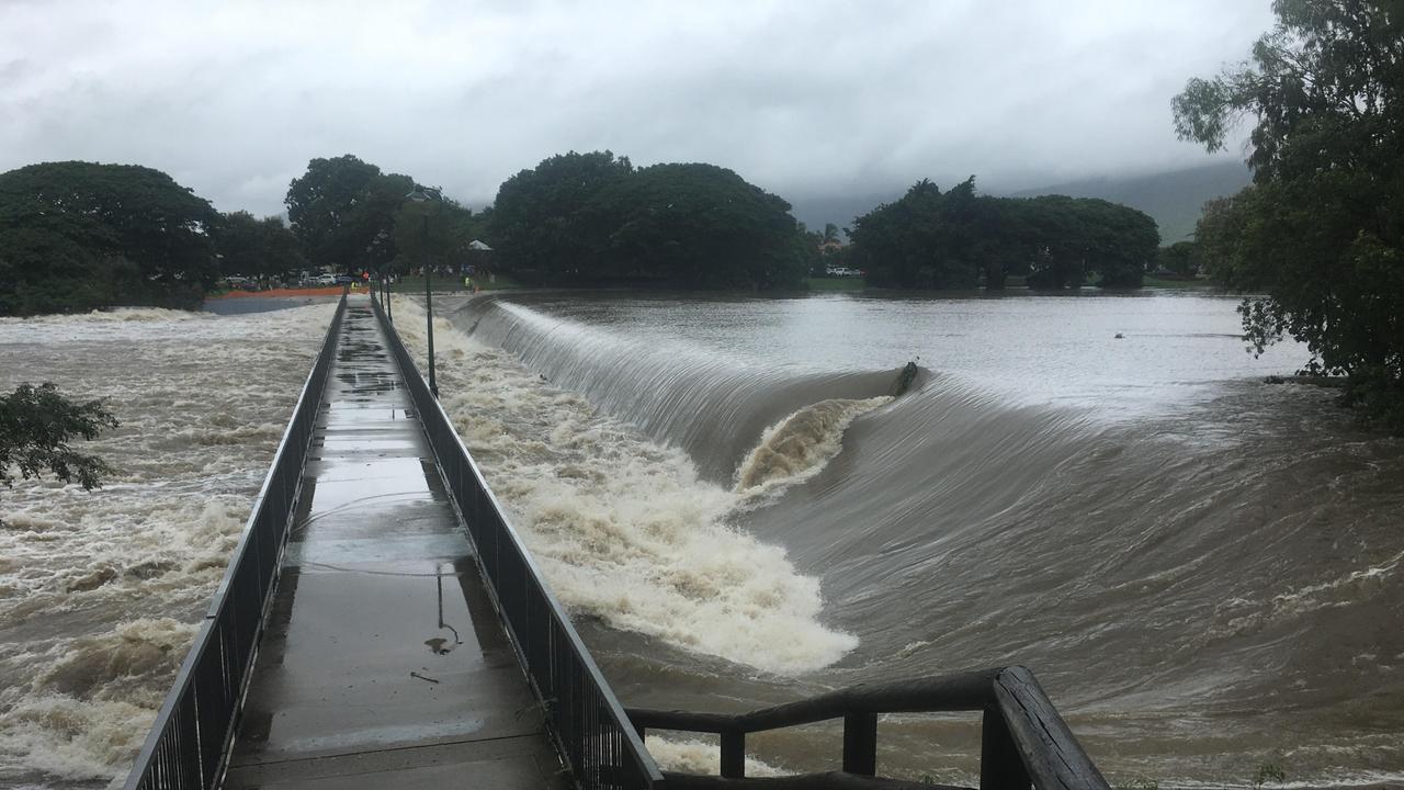 Aplins Weir flowing quickly after Townsville City Council made the call to open the spillway gates of the Ross River Dam, leaving a number of suburbs at serious risk of flooding. Picture: Evan Morgan