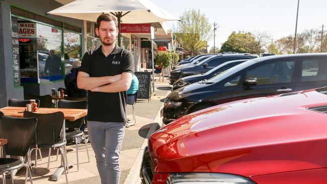 Cafe Rubix manager Daniel Daley is worried about cars hitting diners at the footpath tables.