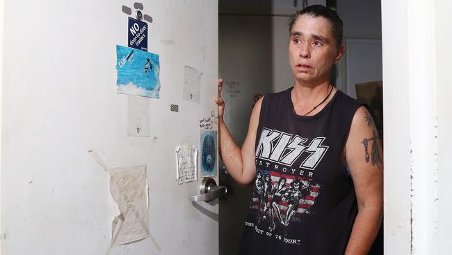 Michelle Dean is terrified she could be harmed by squatters she says have taken over two units at the public housing complex. Picture: Brendan Radke