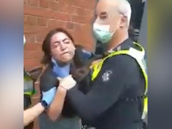 A female allegedly assaulted two police officers and was arrested in Collingwood. Picture : Supplied/Video grabs