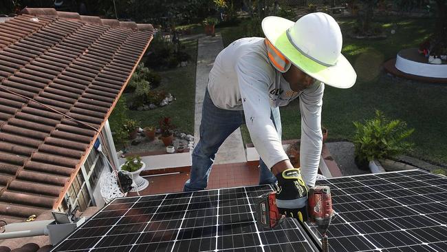 Australians installed a record number of solar panels last year. Picture: Joe Raedle/Getty