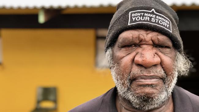 Mark Alice is regularly forced to dig a moat around his house to stop it from flooding and will be part of a legal challenge of the NT Government's remote housing strategies.