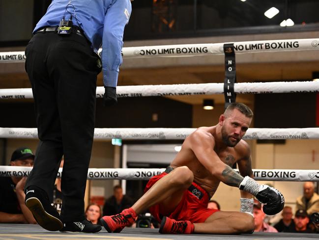 Ryan Mitchem gets up after being knocked down. Picture: No Limit Boxing.