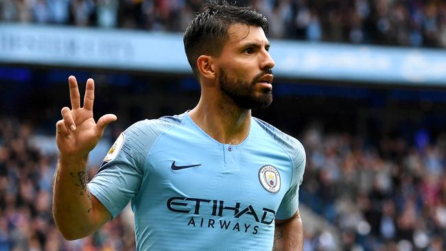 Manchester City’s Sergio Ageuro celebrates bringing up his hat-trick against Huddersfield Town on Sunday. Picture: Getty Images