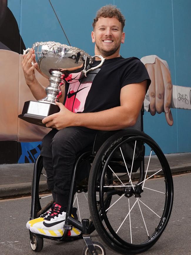 Dylan Alcott with the Australian Open trophy.