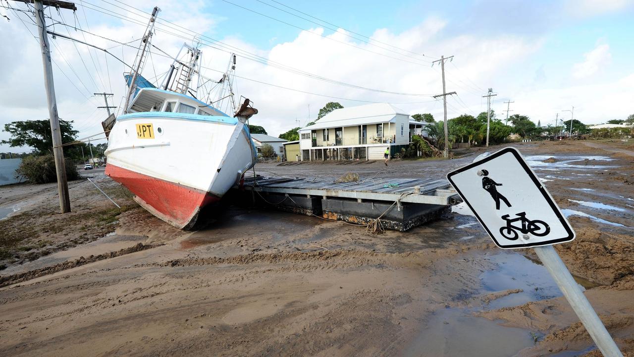 News 1.2.2013, Courier Mail Bundaberg, A trawler sits high &amp; dry in Quay st Bundaberg after the flood. Photo Paul Beutel