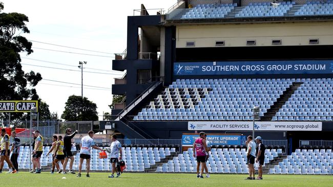 The drone (top right) hovers over a Cronulla training session.