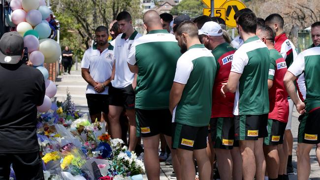 Members of the Lebanon National Rugby League team paid their respects at the makeshift shrine outside Banksia Road Public School in Greenacre last week. Picture: Jonathan Ng