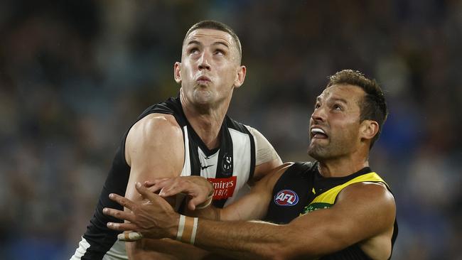 MELBOURNE, AUSTRALIA - MARCH 31: Darcy Cameron of the Magpies and Toby Nankervis of the Tigers contest the ruck during the round three AFL match between Collingwood Magpies and Richmond Tigers at Melbourne Cricket Ground, on March 31, 2023, in Melbourne, Australia. (Photo by Daniel Pockett/Getty Images)