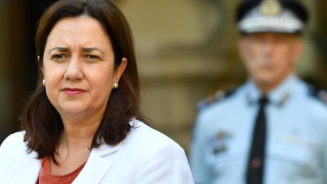 Queensland Premier Annastacia Palaszczuk (left) says it’s “no time for fun”. Picture: AAP/Darren England