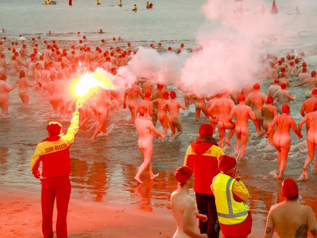 HOBART, AUSTRALIA. NewsWire Photos. JUNE 21, 2024. Dark Mofo Nude Solstice Swim,  3000 participants dived into the very cold River Derwent,  one of the signature things for winter solstice and one of the remaining iconic events of Dark Mofo. It was 7 degrees outside and 12 degrees in the water. Picture: NewsWire/Minch Media