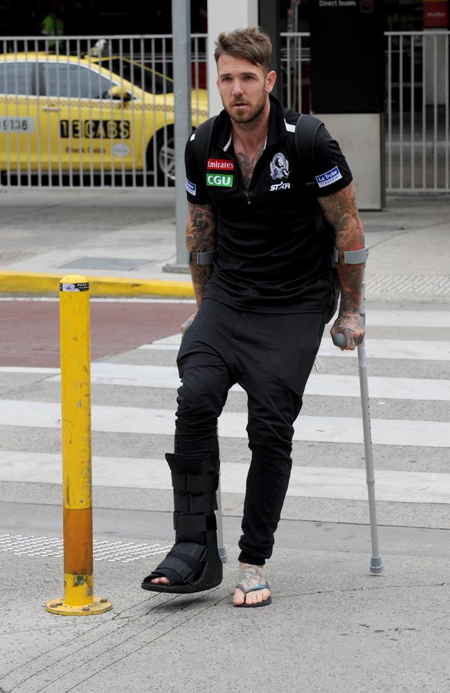 Dane Swan arriving back at Melbourne Airport. Picture: Andrew Henshaw