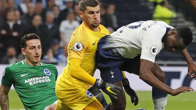 Mat Ryan does his best to keep Spurs at bay.