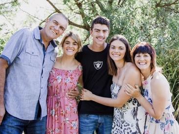 Parkes' Isaac Tulloch, who took his own life in 2019 aged 18, with his parents Simon and Mandy, and sisters Kayla and Laura.