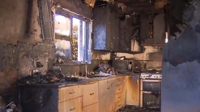 An elderly couple is in intensive care after being pulled from their burning home at Modbury. The blaze was sparked by a cooking accident. Picture: 7NEWS Adelaide