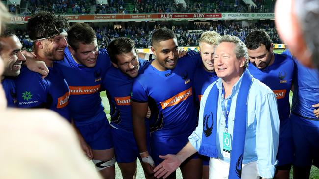 Saviour ... Andrew Forrest, celebrates with Western Force players after they won a World Series Rugby match against Fiji in Perth, in 2018. Picture: AAP