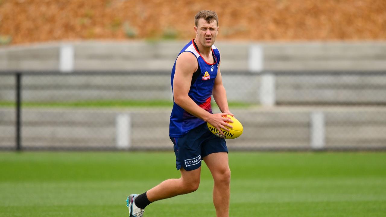 MELBOURNE, AUSTRALIA - NOVEMBER 27: Jack Macrae of the Bulldogs trains during a Western Bulldogs AFL training session at Whitten Oval on November 27, 2023 in Melbourne, Australia. (Photo by Morgan Hancock/Getty Images)