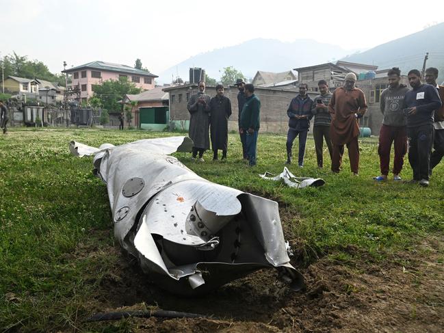 Debris from an aircraft in Wuyan near Indian-administered Kashmir’s main city of Srinagar. Picture: AFP