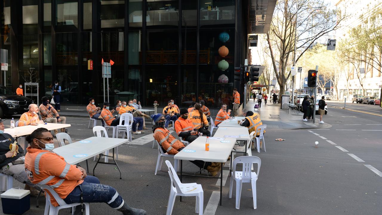 Construction workers set up an outdoor break room in central Melbourne. Picture: NCA NewsWire / Andrew Henshaw