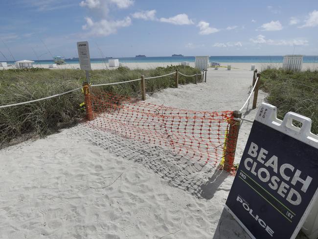 Florida's famed South Beach may remain closed on Memorial Day, which traditionally signals the beginning of summer. Picture: AP Photo/Wilfredo Lee, File