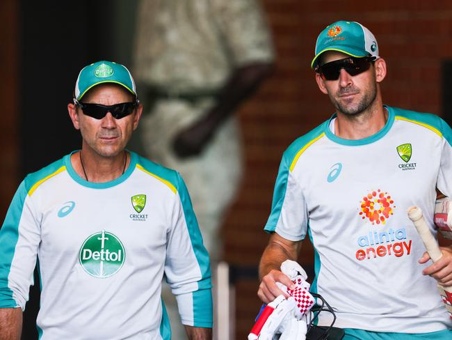 ADELAIDE, AUSTRALIA - DECEMBER 15: (L-R) Justin Langer coach of Australia and Joe Burns of Australia chat during an Australian nets session at Adelaide Oval on December 15, 2020 in Adelaide, Australia. (Photo by Daniel Kalisz/Getty Images)