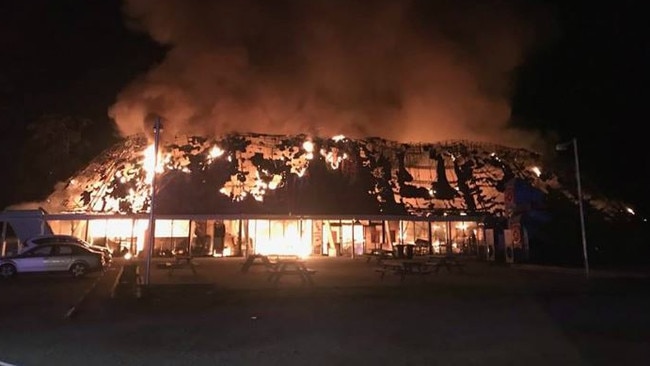 The Rock Roadhouse on the NSW Pacific Highway being destroyed by fire. It was once known as Leyland Brothers World. Picture: News Corp Australia 