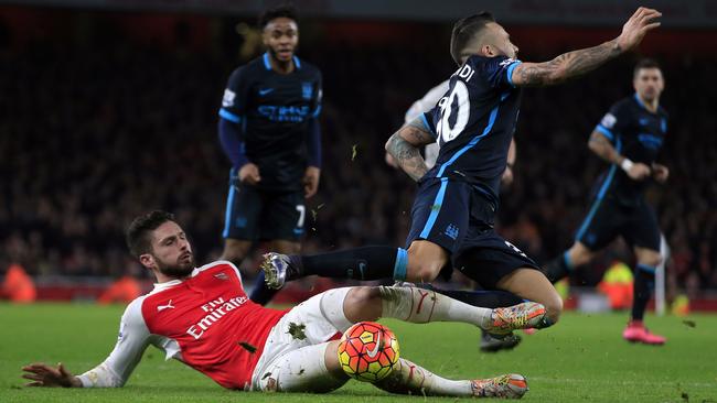 Arsenal and Manchester City battle it out.