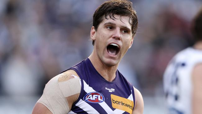 GEELONG, AUSTRALIA - JULY 29: Lachie Schultz of the Dockers celebrates a goal during the round 20 AFL match between Geelong Cats and Fremantle Dockers at GMHBA Stadium, on July 29, 2023, in Geelong, Australia. (Photo by Martin Keep/Getty Images)