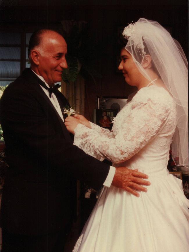 Julie Hutchinson pictured with her father Silvano Beraldo on her wedding day. 