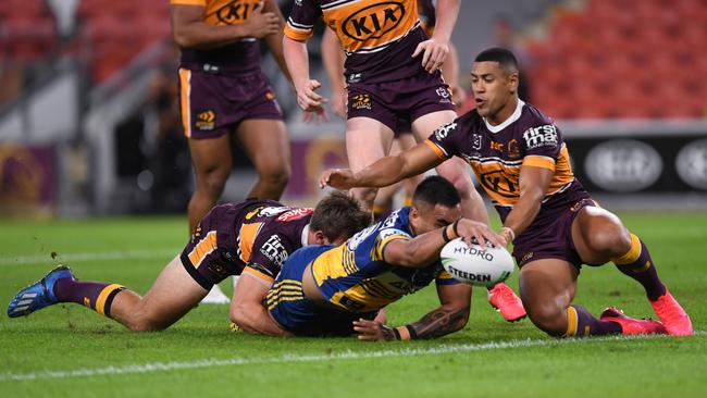 Marata Niukore scores the opening try of the restarted 2020 season. Picture: NRL Photos via AP.