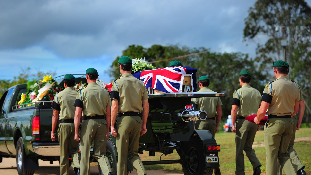 The casket of Private Benjamin Chuck on a gun carriage flanked by 2nd Commando Regiment colleagues, who was from Yungaburra in Queensland.
