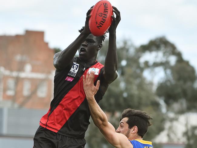 Gach Nyuon marks for Essendon’s VFL team. Picture: Carmelo Bazzano