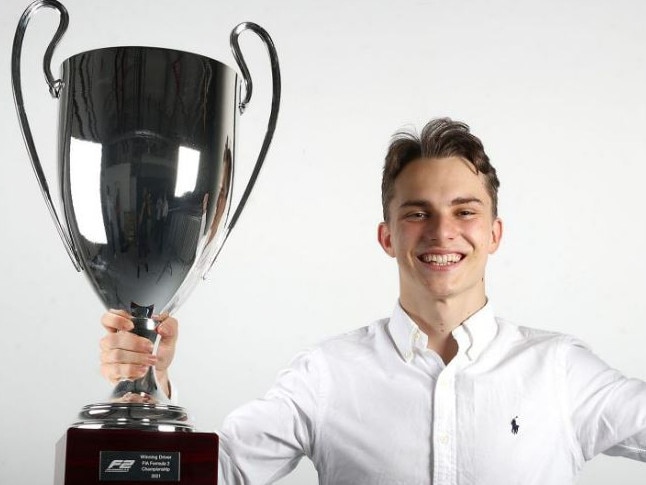 Piastri with his 2021 F2 championship trophy.