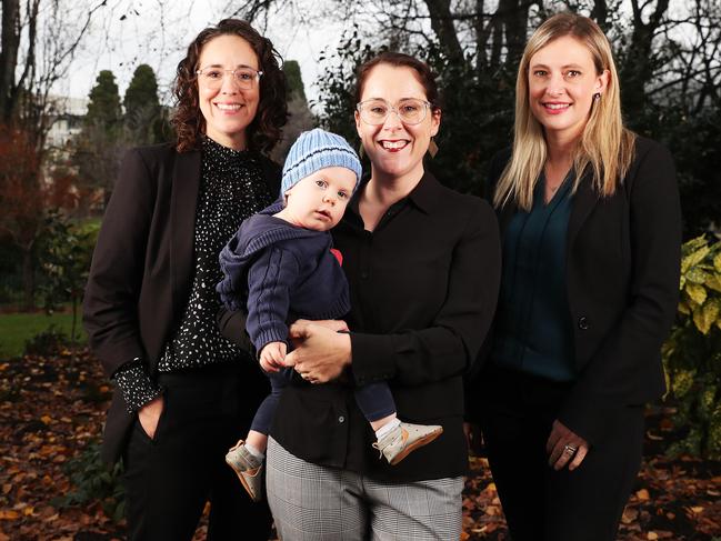 Tasmanian union leaders Thirza White (CPSU), left, Jessica Munday (Unions Tasmania) with son Patrick, 10 months, and Emily Shepherd (ANMF). Picture: Nikki Davis-Jones