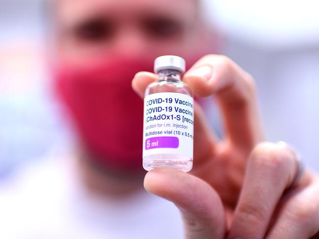 BRISBANE, AUSTRALIA - NewsWire Photos - AUGUST 8, 2021. Pharmacist Michael Thorp holds a vial of the AstraZeneca Covid-19 vaccine the at the Carina Day and Night pharmacy in Brisbane. Picture: NCA NewsWire / Dan Peled