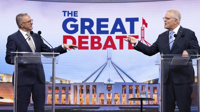 SYDNEY, AUSTRALIA - MAY 08: (L-R) Australian opposition leader Anthony Albanese and Australian Prime Minister Scott Morrison debate on live television ahead of the federal election, during the second leaders' debate of the 2022 federal election campaign at the Nine studio on May 8, 2022 in Sydney, Australia. The Australian federal election will be held on Saturday 21 May with Liberal leader Scott Morrison looking to secure a fourth term in power for the Coalition against Labor and opposition leader Anthony Albanese. (Photo by Alex Ellinghausen - Pool/Getty Images)