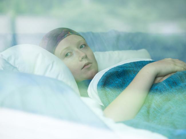 RendezView. Young woman in bed suffering from cancer. (Pic: iStock)