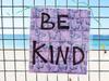 Along the Coogee Beach esplanade messages of kindness and hope from community members has popped up on the fencing. Picture: David Swift