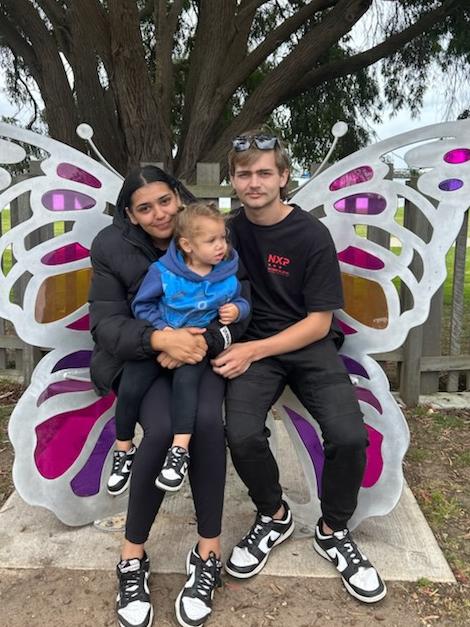 Marisha Smith and Riley Raynor with their daughter Malayah Smith.