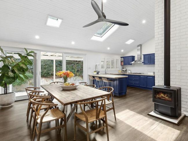 The four-bedroom, three-bathrom home has open interiors under double-height ceilings. Picture: realestate.com.au